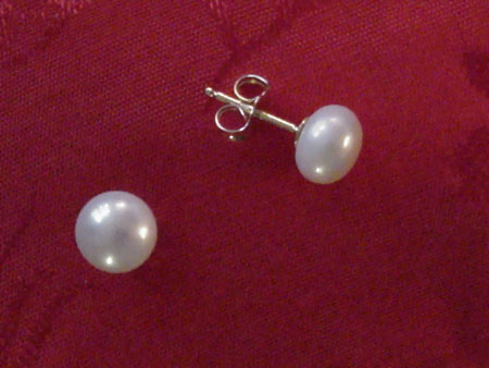 7.5mm round white pearl earrings with 10K GF stems.