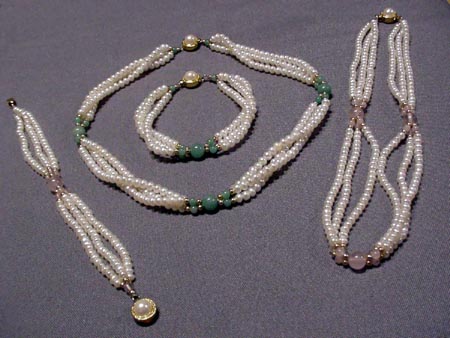 17.5 in. three strand, white, pearl necklace and matching 7.5 in. bracelet set with jade beads.